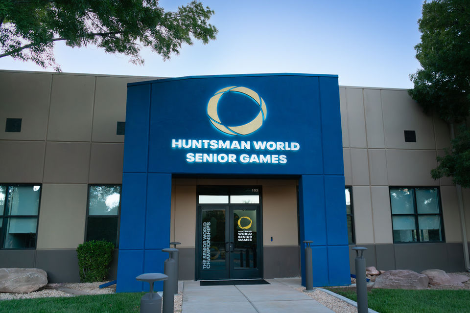 "Huntsman World Senior Games" Exterior signage including Huntsman logo and lettering lit by hidden LEDs