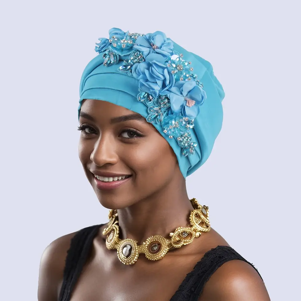 Thumbnail: Woman wearing a teal spiral beret head wrap with floral detail