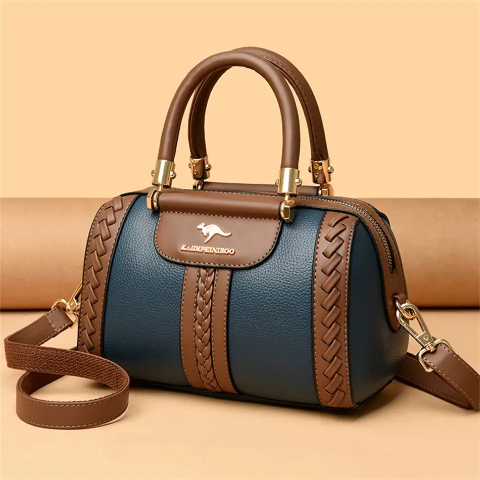 Thumbnail: Luxury leather handbag with kangaroo logo and braided trim
