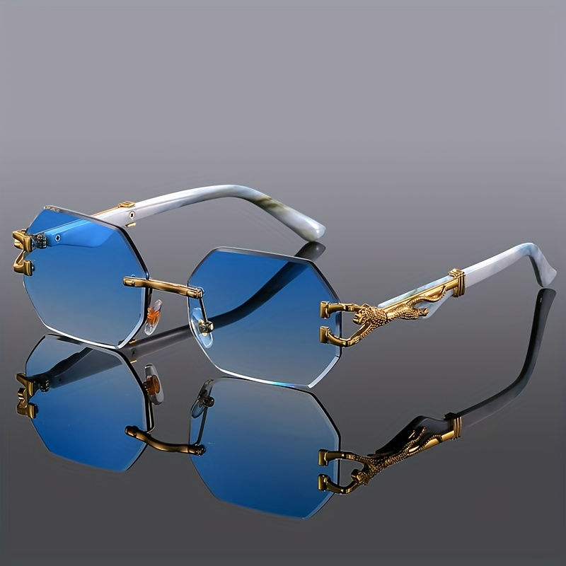Rimless blue tinted sunglasses with gold jaguar details