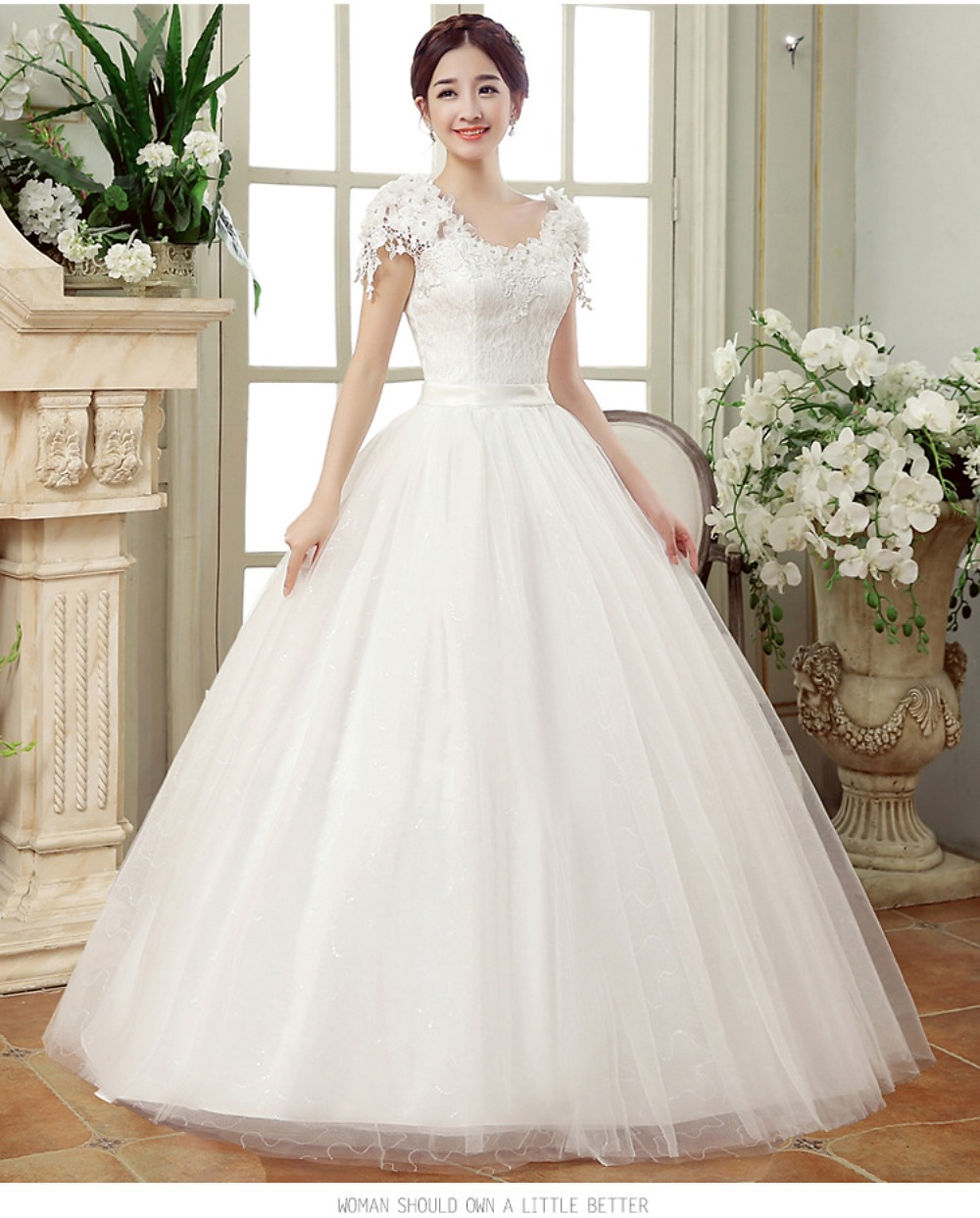 Thumbnail: Plus size white floor-length wedding dress with lace flowers