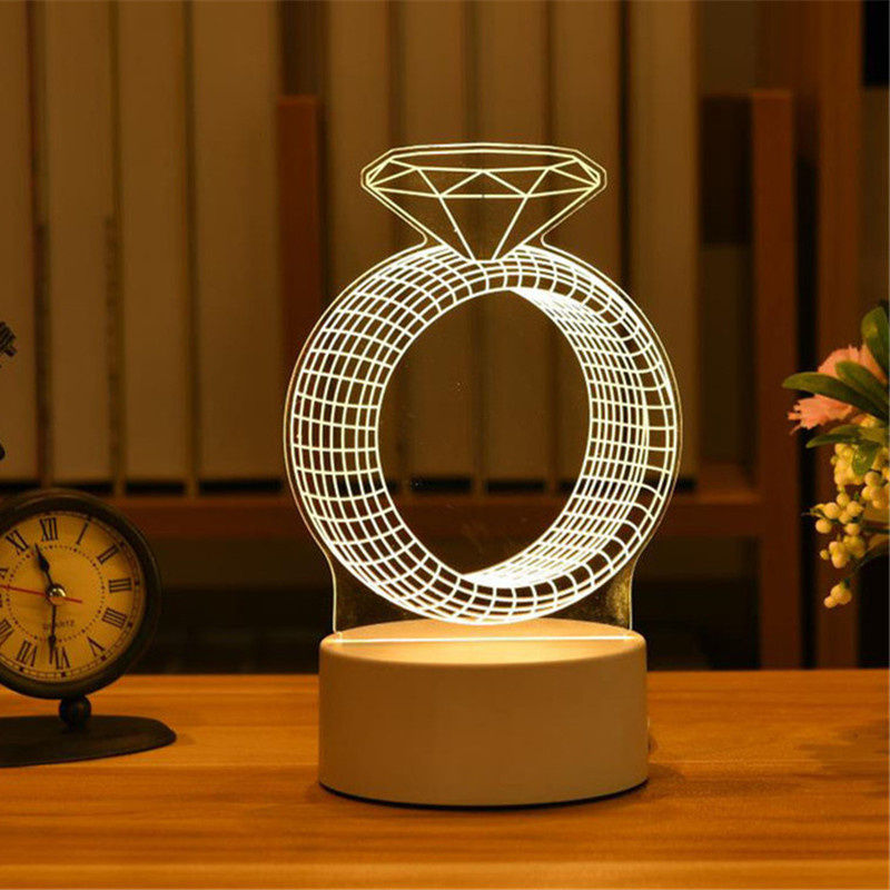 Thumbnail: 3D illusion ring lamp on a wooden table