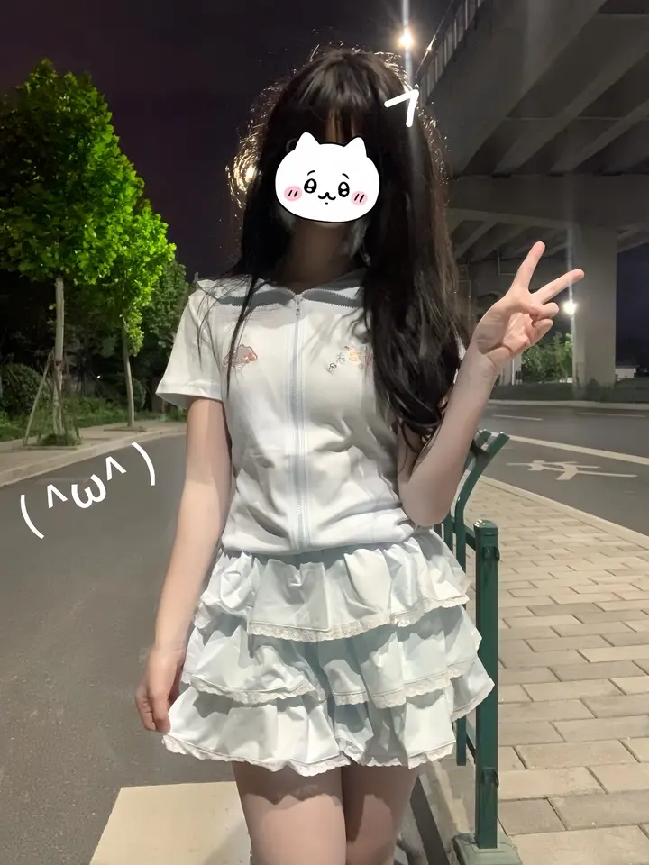 Thumbnail: Woman in Japanese Kawaii Lolita top and tiered skirt