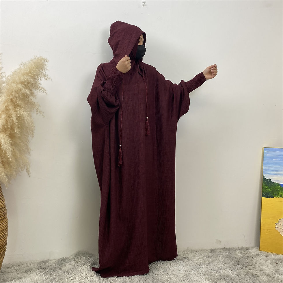 Thumbnail: Maroon hooded prayer abaya for women on a model