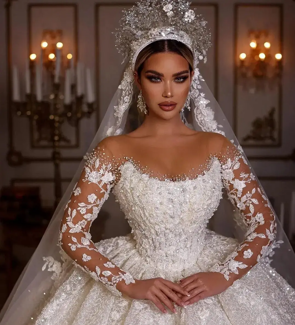 Bride in a vintage princess wedding dress with beading.