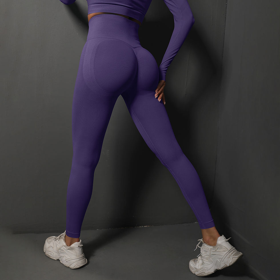 Thumbnail: Woman in purple high-waisted leggings and matching top.