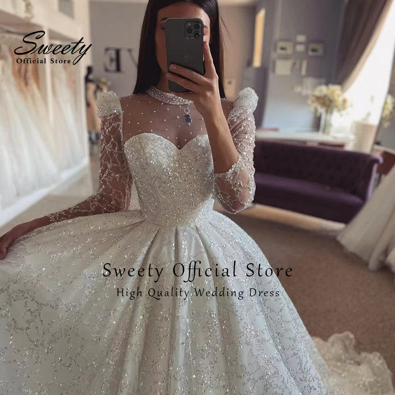 Thumbnail: High-neck organza ball gown with embroidery and beading