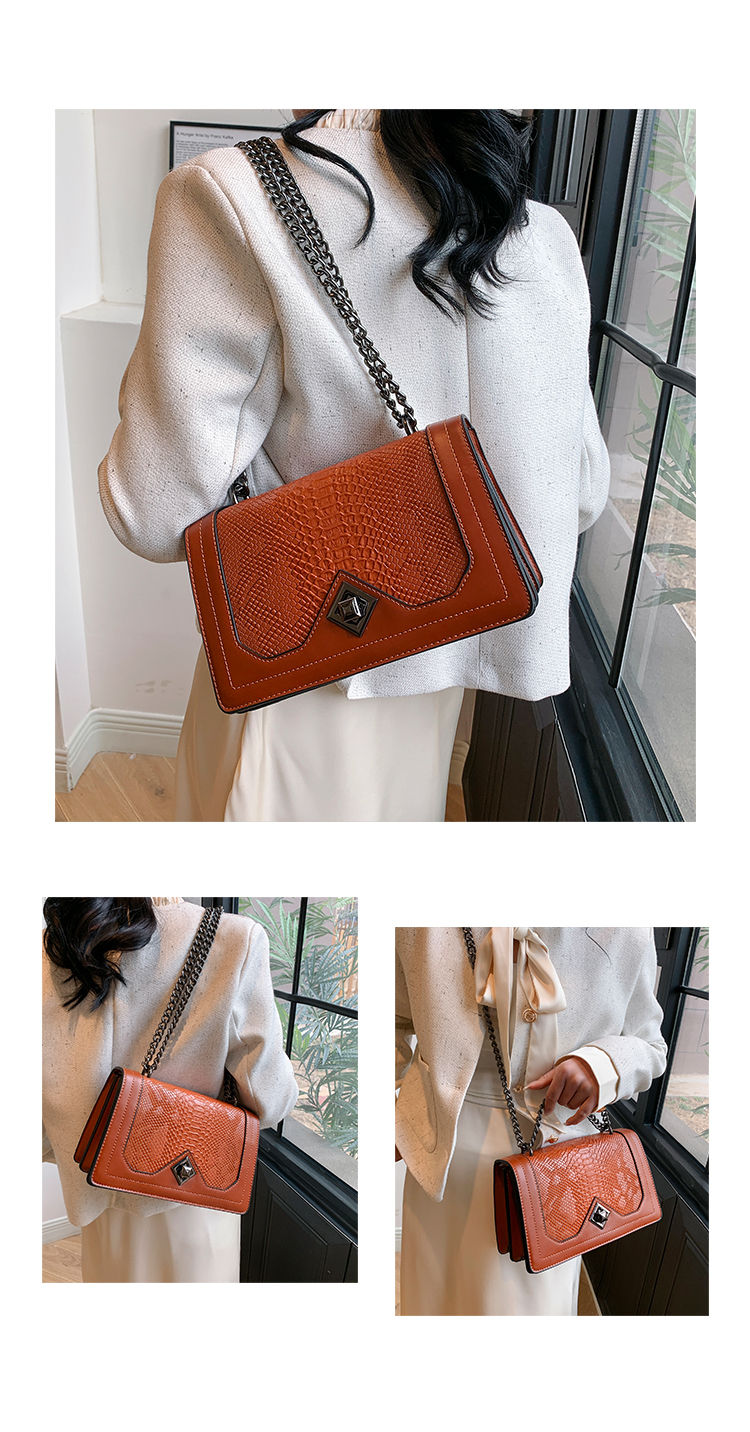 Thumbnail: Brown leather shoulder bag with chain strap on woman.