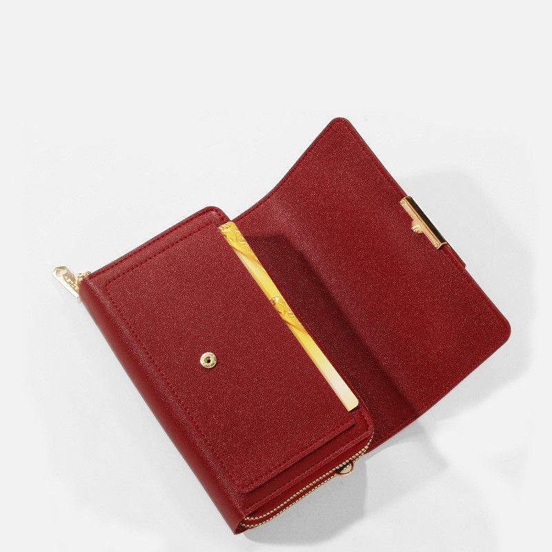 Thumbnail: Interior view of open red PU leather crossbody bag showing pockets