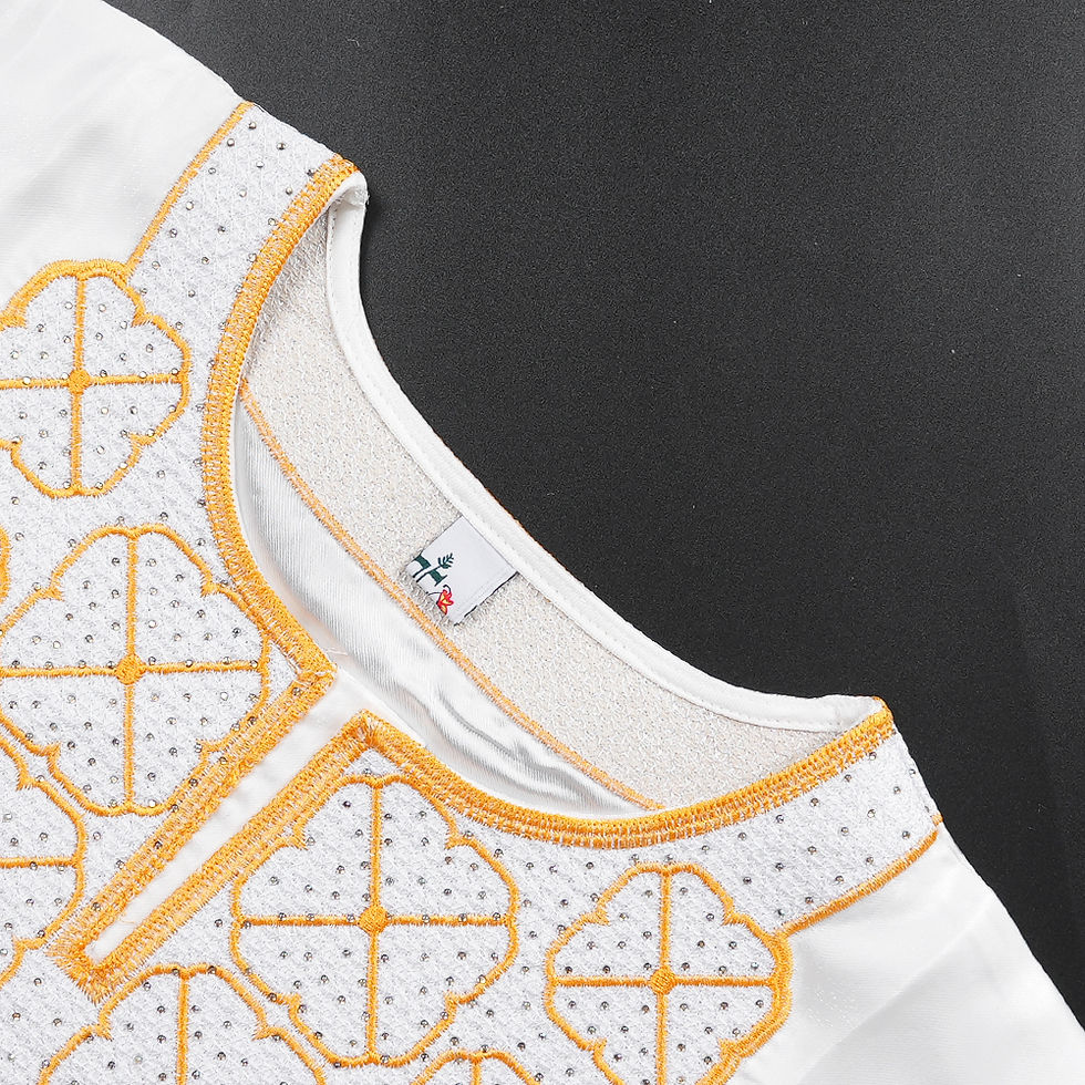 Thumbnail: Neckline detail of white boubou with gold embroidery