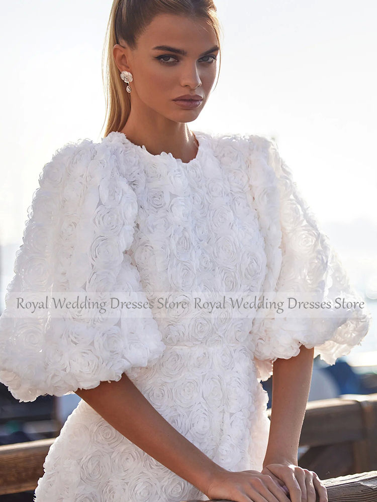 Thumbnail: White chiffon wedding dress with handmade flower details