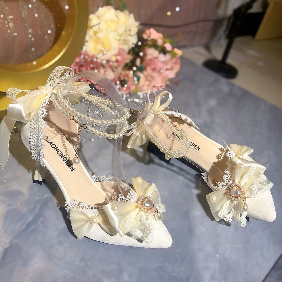 Thumbnail: White Mary Jane bridal shoes with pearls and bows.