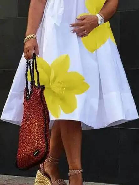 Thumbnail: White v-neck summer dress with large yellow flower print