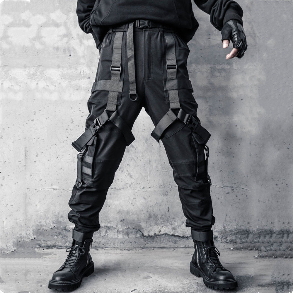 Man wearing techwear cargo pants with multi ribbons