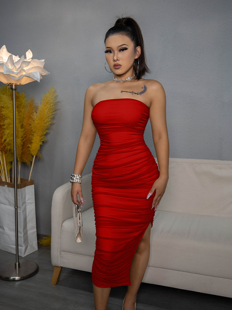 Woman in a fitted strapless red midi dress
