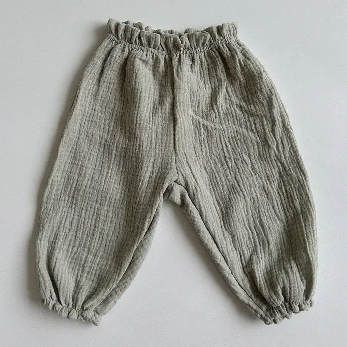 Thumbnail: Grey muslin baby trousers with elasticated waist and cuffs