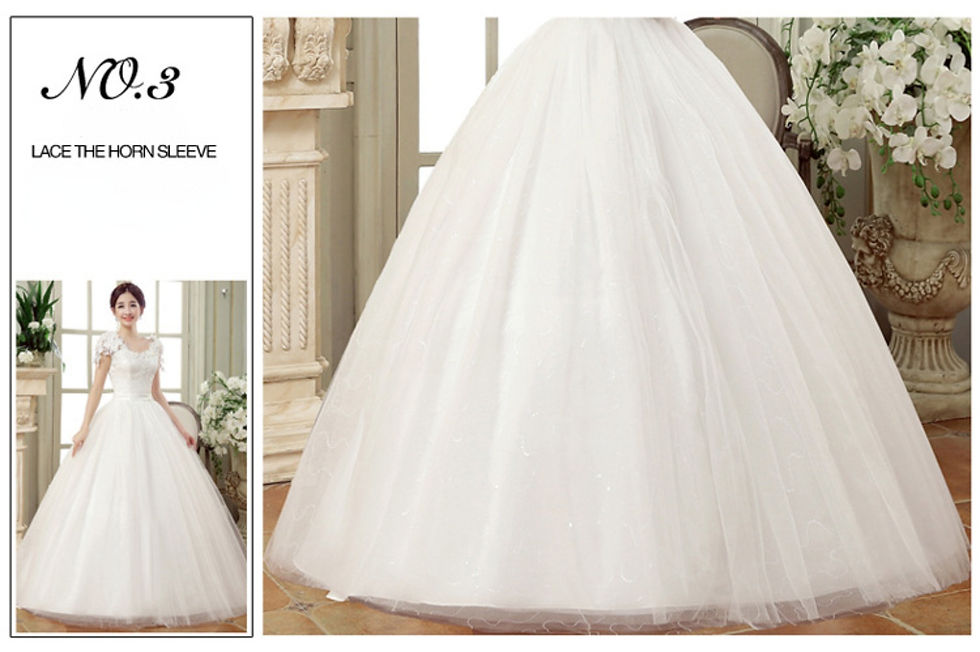 Thumbnail: Full skirt of a floor-length lace flower wedding dress.