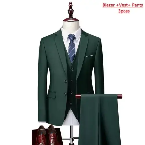 Thumbnail: Dark green three-piece business suit with blazer, vest, and pants.