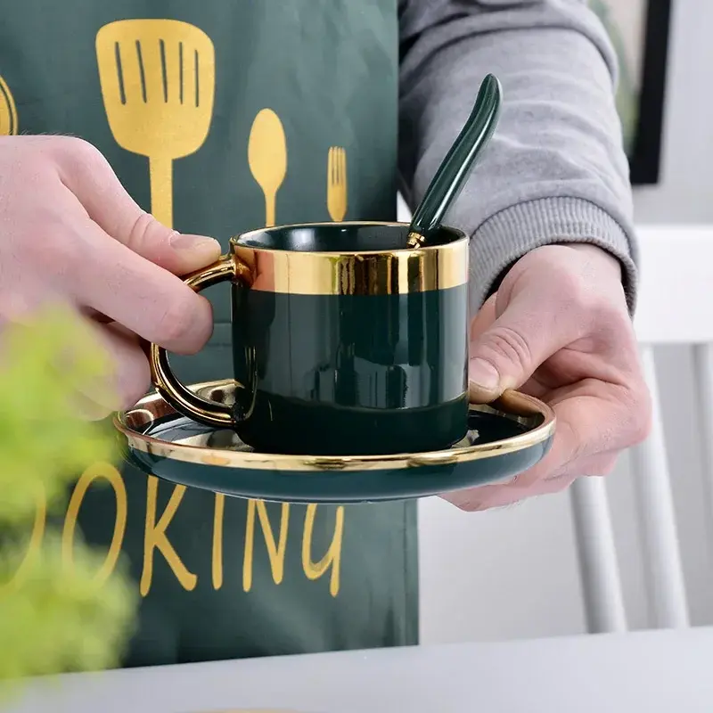 Thumbnail: Luxury green ceramic coffee cup with gold rim and spoon