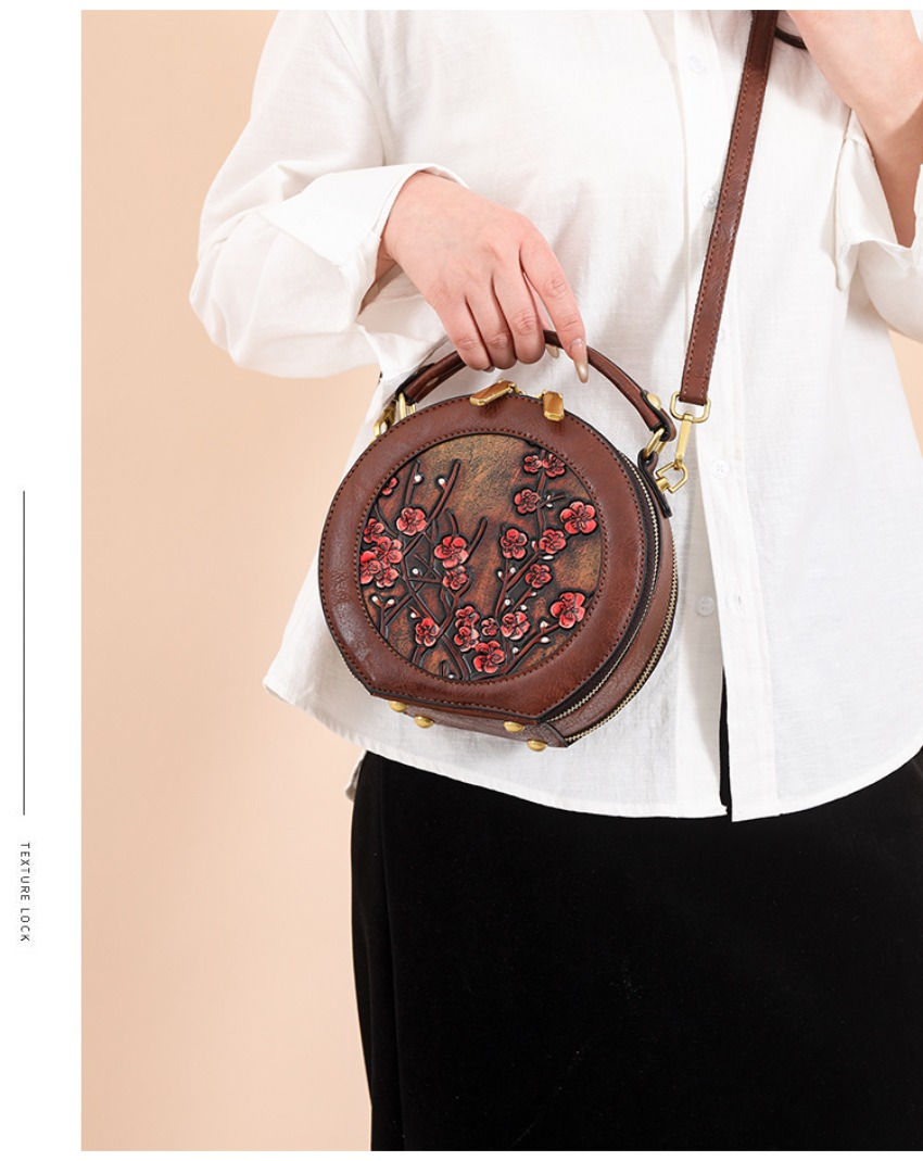 Thumbnail: Vintage designer round shoulder bag with floral embroidery