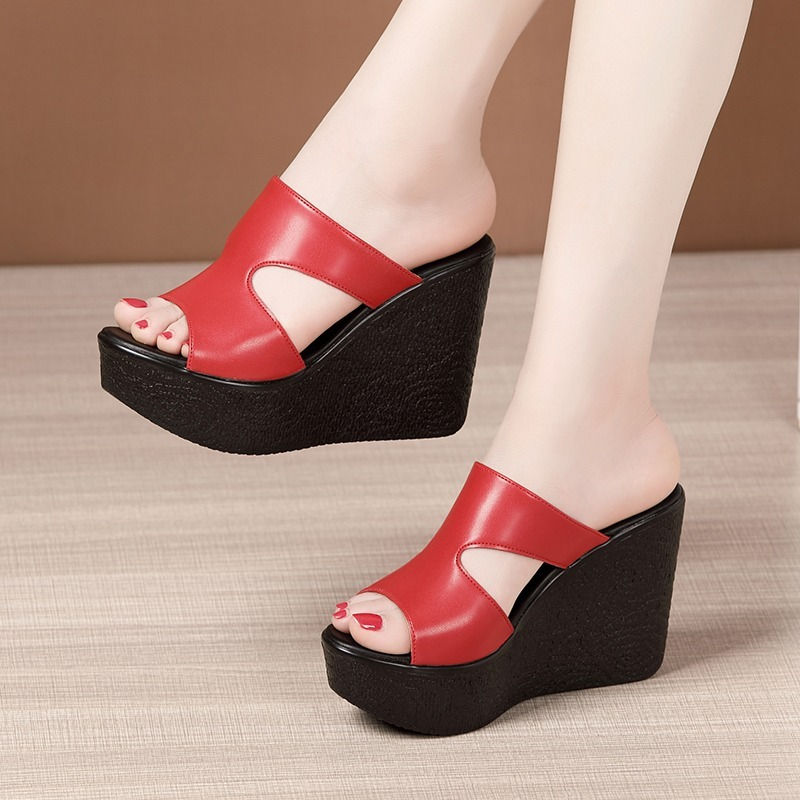Thumbnail: Red wedge platform slippers with black high heel soles