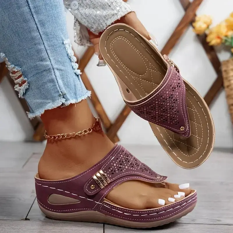 Thumbnail: Women wearing purple open toe wedge flip flop sandals