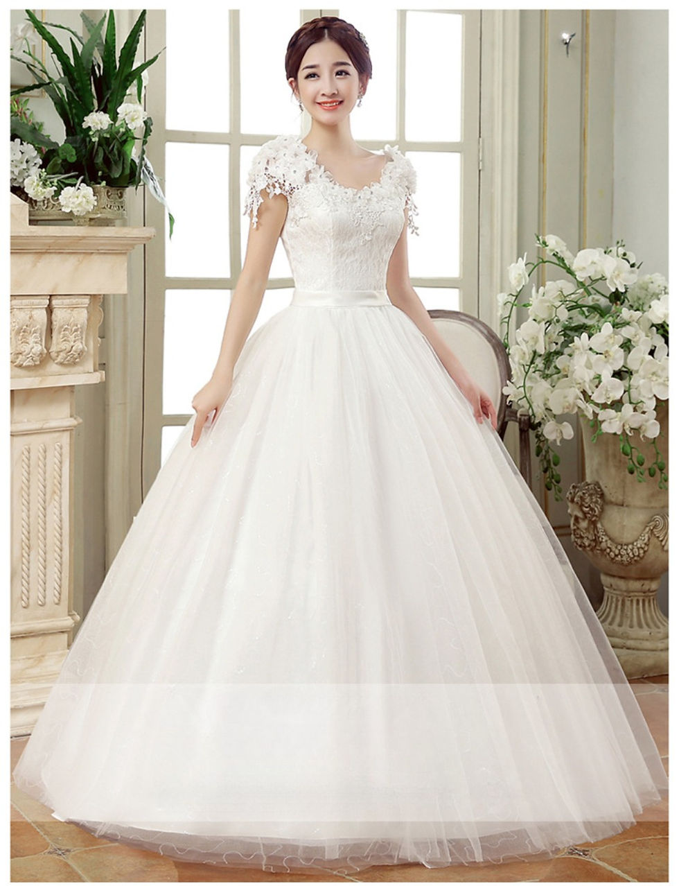 Thumbnail: Plus size white floor-length wedding dress with lace flowers