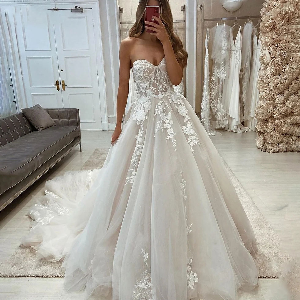 Thumbnail: Strapless 2025 bridal gown with floral lace bodice