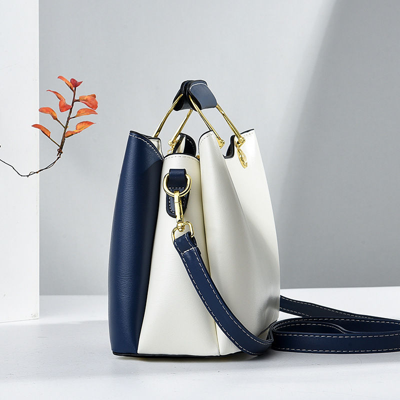 White and navy blue top handle satchel handbag