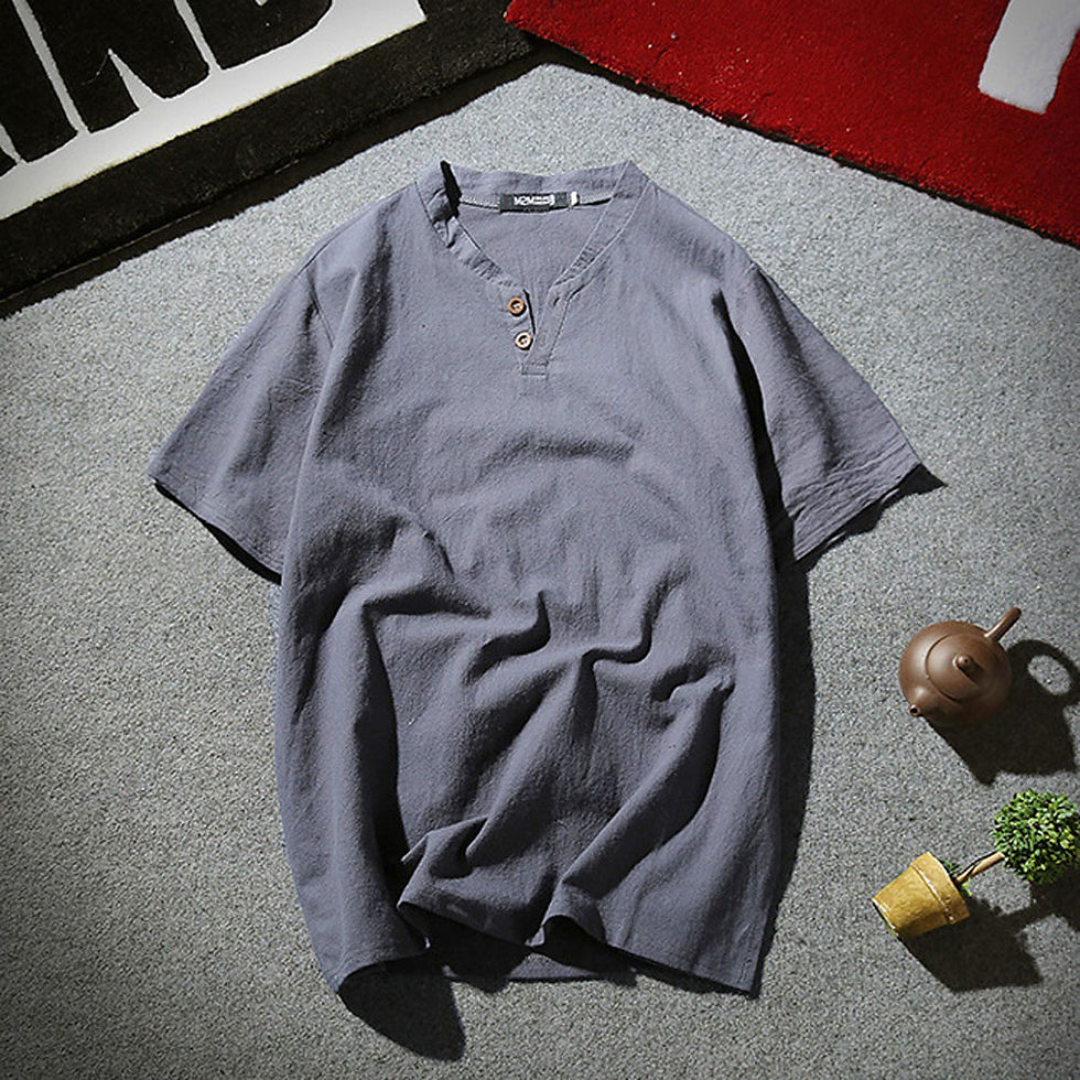Thumbnail: Grey short sleeve V-neck linen shirt displayed on a grey surface