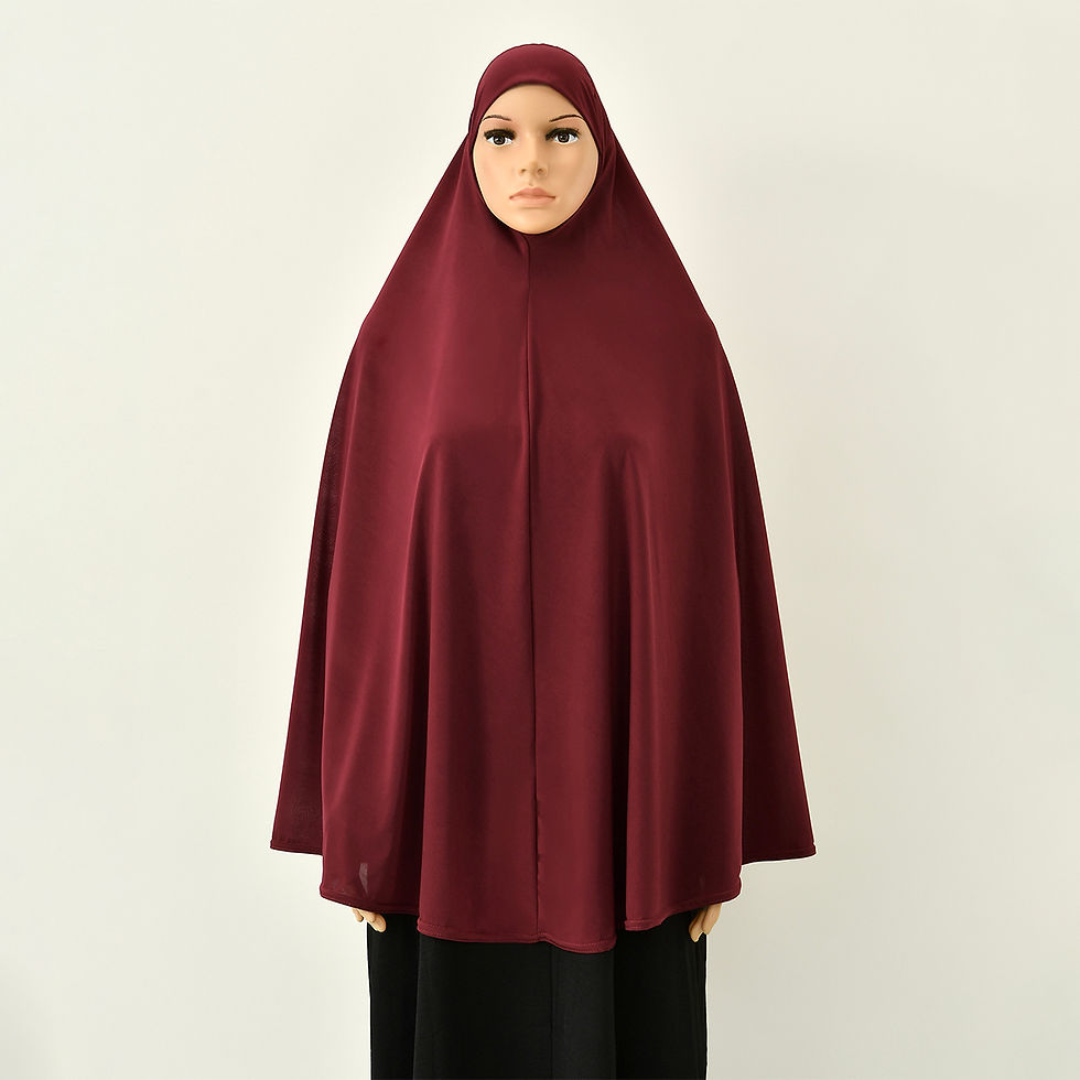 Thumbnail: Woman wearing a burgundy solid color premium inner hijab