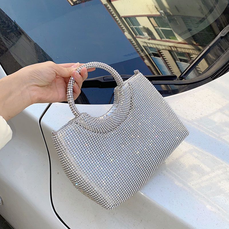 Thumbnail: Silver sparkling evening clutch with round handle