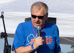 Dale Carter from KFKF introducing Anthony Juarez at Throwback Throwdown.