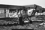A student-pilot posing in front of Stampe Vertongen SV-4B V-42 at Goetsenhoven airbase.