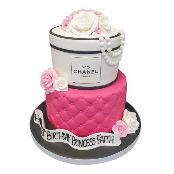 Luxurious black and white Chanel themed cake with elegant design suitable for stylish events and fashion lovers.