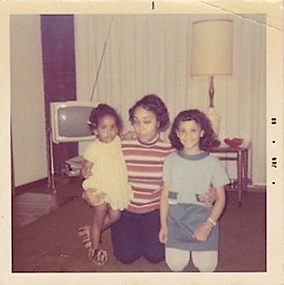 Mother? and children pose in front of TV, 1969.