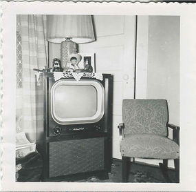 Portrait of TV, knick-knacks on top, circa 1950-55.