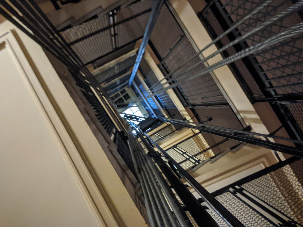 Looking up the elevator shaft of the Teatro Colon in Buenos Aires, Argentina and contemplating how many important historical figures have taken this lift