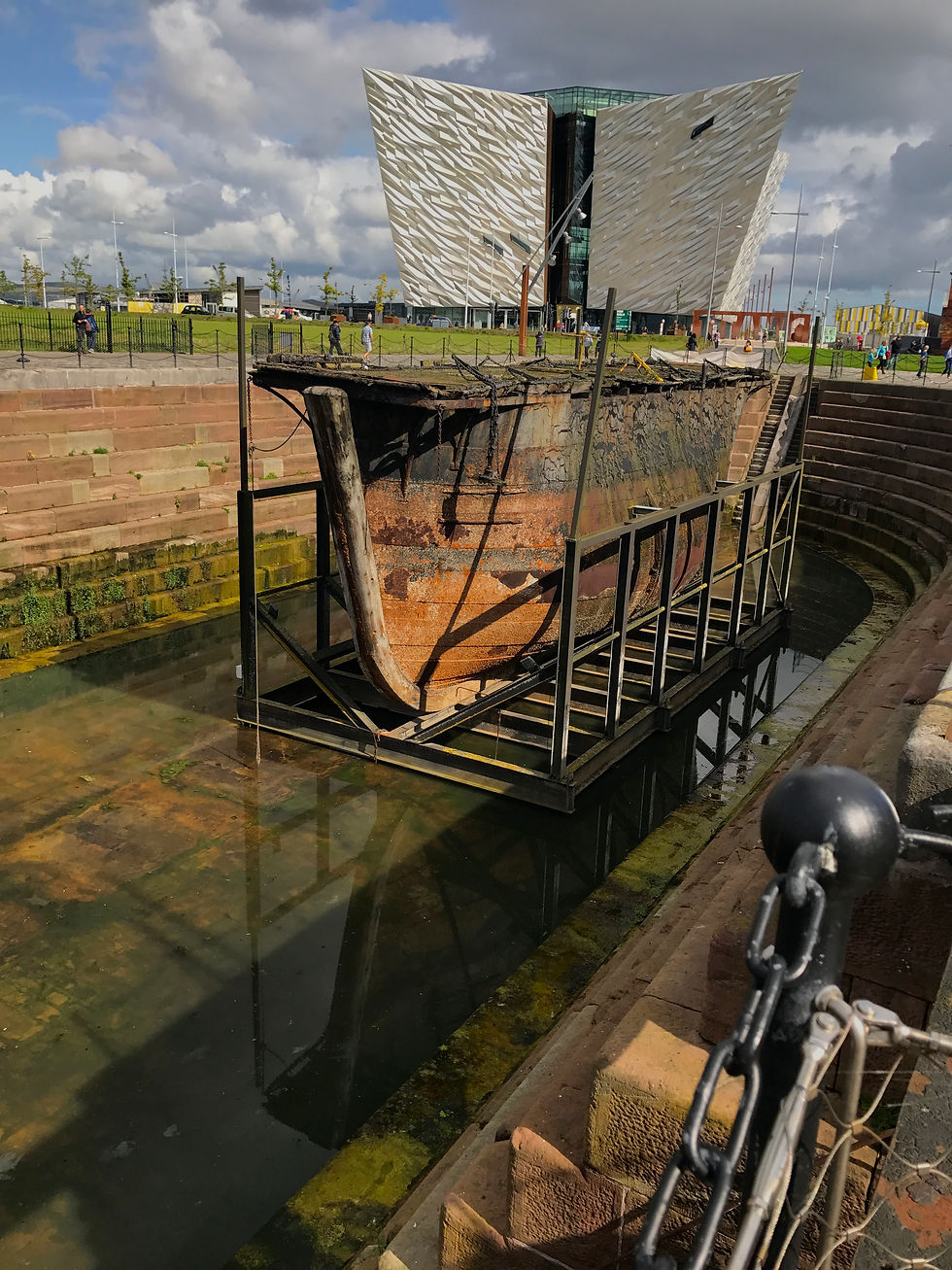 Another half built ship with the museum in the background