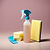 a spray bottle and a sponge