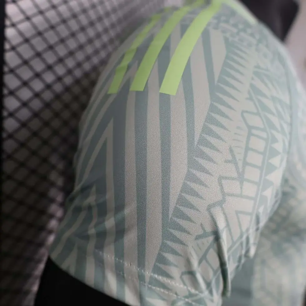 Thumbnail: Close-up of retro Manchester United away football shirt sleeve