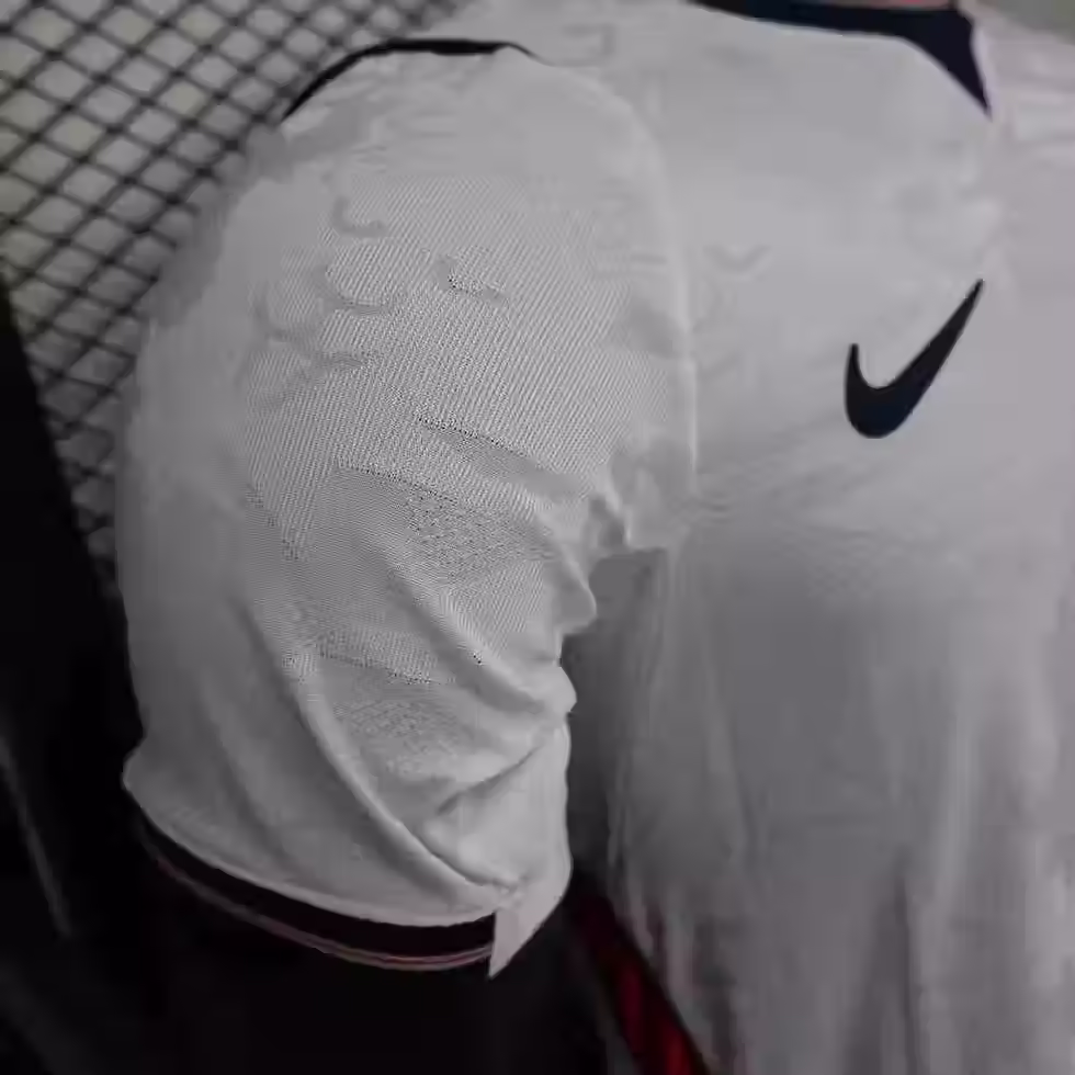 Thumbnail: Shoulder detail of the white England 2026 soccer jersey