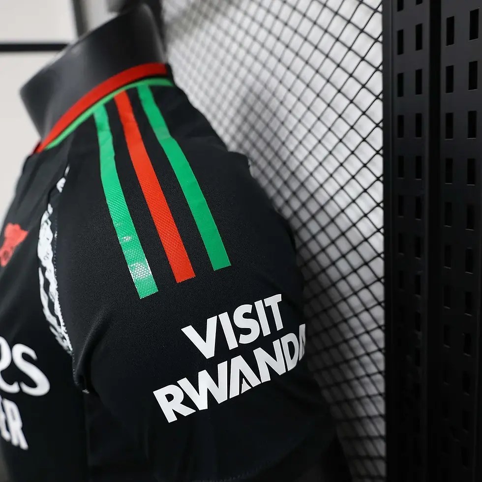 Thumbnail: Sleeve of a black football shirt with Visit Rwanda logo