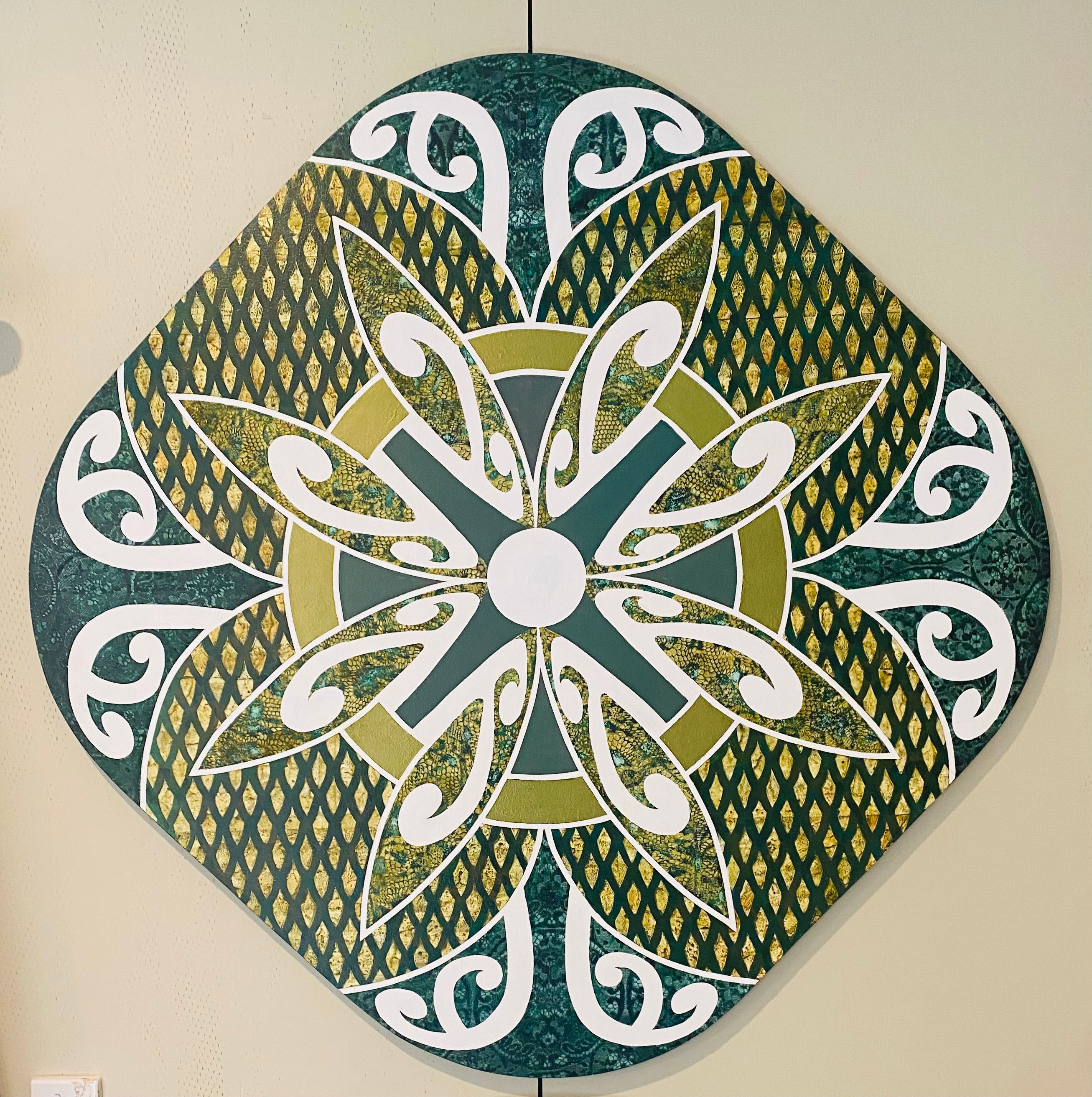 Korowai - distinctive lozenge shape has a very indigenous look, with the unfurling frond shapes on the outer edges, and the s