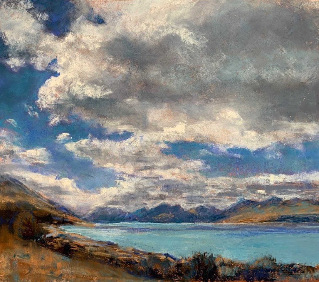 The finished pastel painting: cool cloud masses over turquoise water, with orange underpainting sparkling through the land and cloud