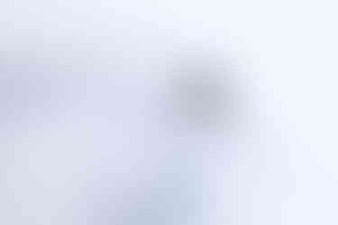 Photo of a skier in deep powder