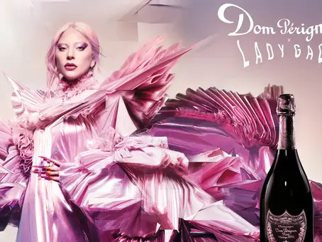Lady Gaga styled by Marta del Rio in Dom Pérignon Rosé campaign, surrounded by sculptural pink costumes and surreal visual elements