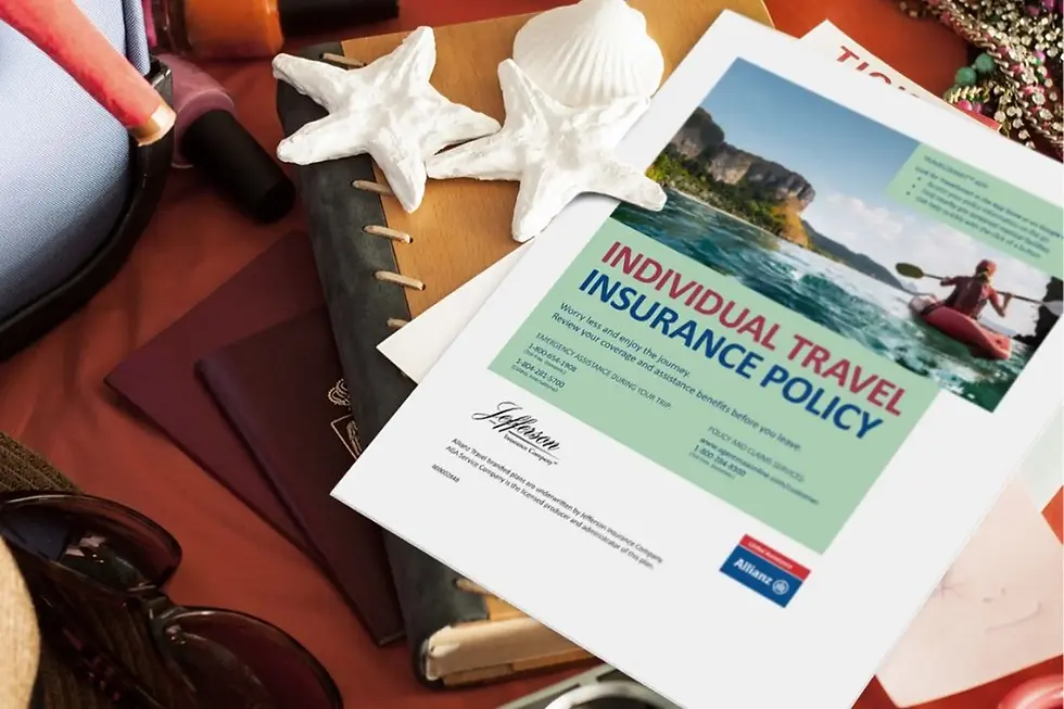 Close-up view of a health insurance card and policy documents on a desk
