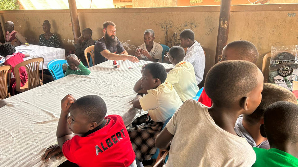 Steve spending time with the COP children before the meal was served.