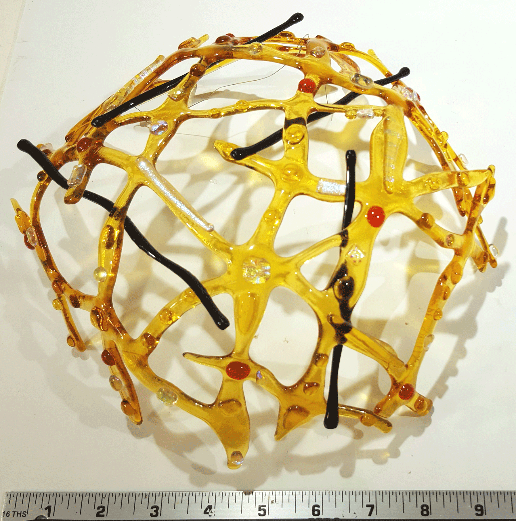 7a Organic-Variation-Bullseye-Yellow-with-Goo-Gaas-and-Black-Streamers-.png